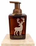 Vanilla bean foaming hand soap in amber bottle with pearl reindeer and gold star charm