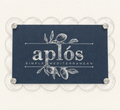 Clear scalloped acrylic frame holding an example gift card