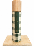Sand + Fog Winter Citrus Spice room spray with green plaid design and wood cap
